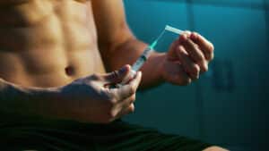 man about to inject steroids